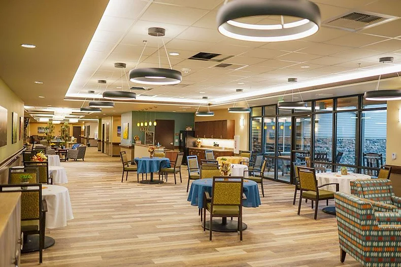 Fieldstone Memory Care of Puyallup sitting area with tables