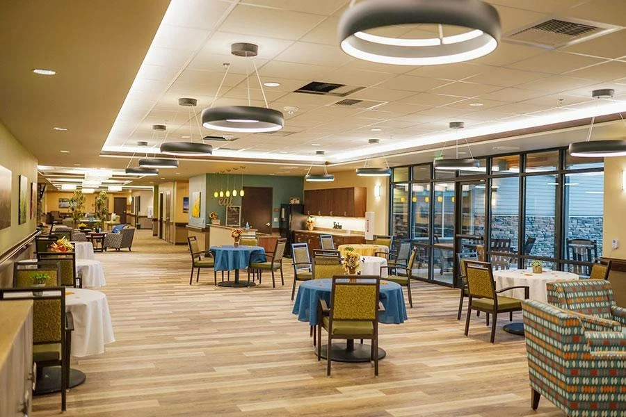 Fieldstone Memory Care of Puyallup sitting area with tables