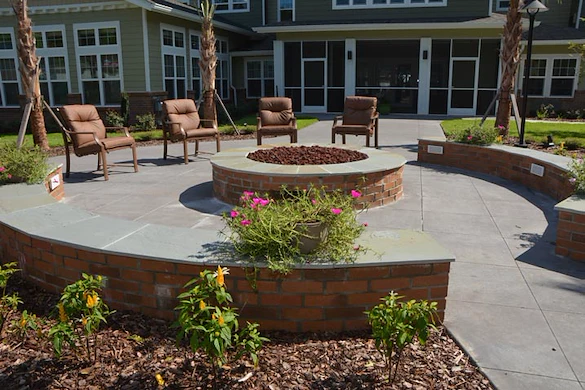Orchard Heights Gracious Retirement Living Hawthorn Senior Independent Living in Clermont, Florida rear exterior patio firepit