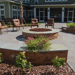 Orchard Heights Gracious Retirement Living Hawthorn Senior Independent Living in Clermont, Florida rear exterior patio firepit