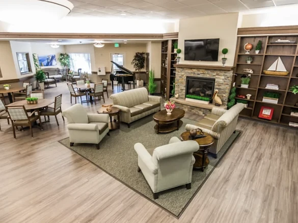 Fieldstone Memory Care of Yakima community sitting area by fireplace