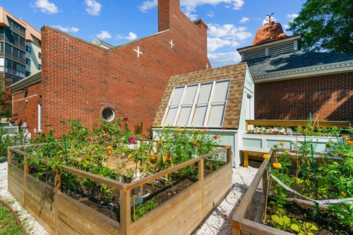 Raised bed resident gardens bloom all year long!