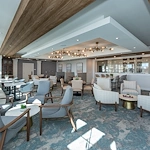 Acclaim at The Hill, senior living community offering active adult and independent living in Fredericksburg, VA, sitting area with tables and chairs