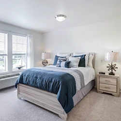 Steeplechase Gracious Retirement Living Hawthorn Senior Independent Living in Oxford, Florida apartment bedroom