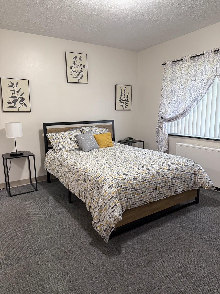 Wesley Manor Assisted Living Community offering assisted living and continuing care retirement community (CCRC) services in Louisville, KY, apartment bedroom