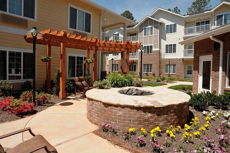 Whispering Pines Gracious Retirement Living Hawthorn Senior Independent Living in Raleigh, North Carolina rear exterior patio firepit gazebo