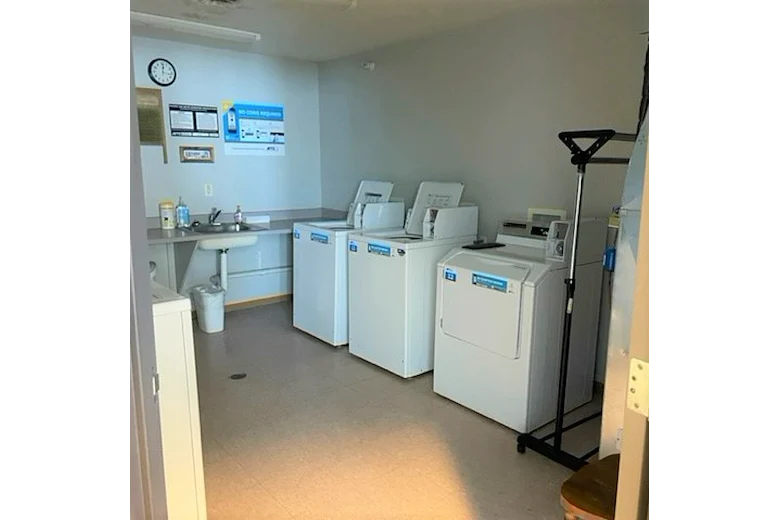 Sugar Creek Apartments independent senior living in Waukee, Iowa laundry room