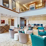 CopperWood at Prairie Trail senior living community offering assisted living and memory care in Ankeny, IA, common socializing area