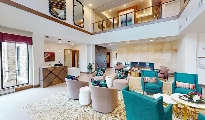 CopperWood at Prairie Trail senior living community offering assisted living and memory care in Ankeny, IA, common socializing area