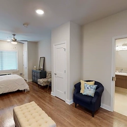 Barclay House of Baton Rouge senior living community offering assisted living and memory care in Baton Rouge, LA, studio apartment featuring the living and bedroom areas