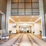 Watermere at the Preserve senior living community offering active adult living and independent living in North Richland Hills, TX, lobby with high ceilings and seating options