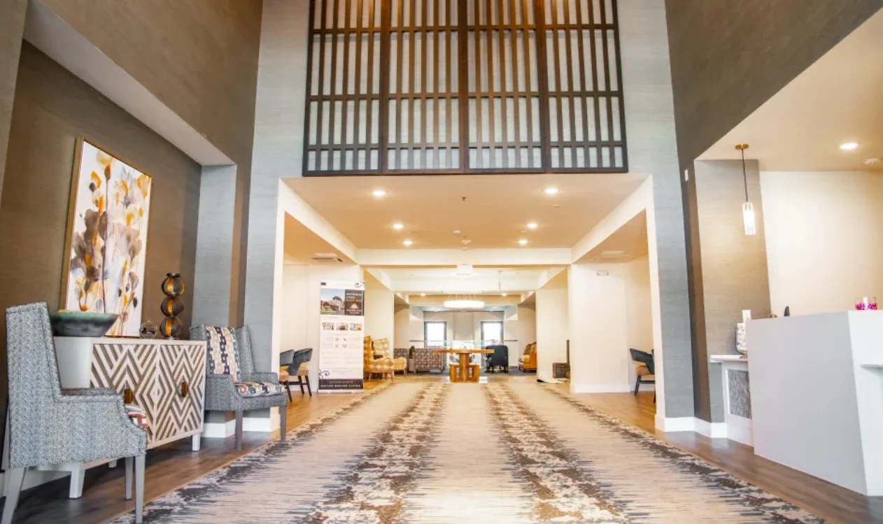 Watermere at the Preserve senior living community offering active adult living and independent living in North Richland Hills, TX, lobby with high ceilings and seating options