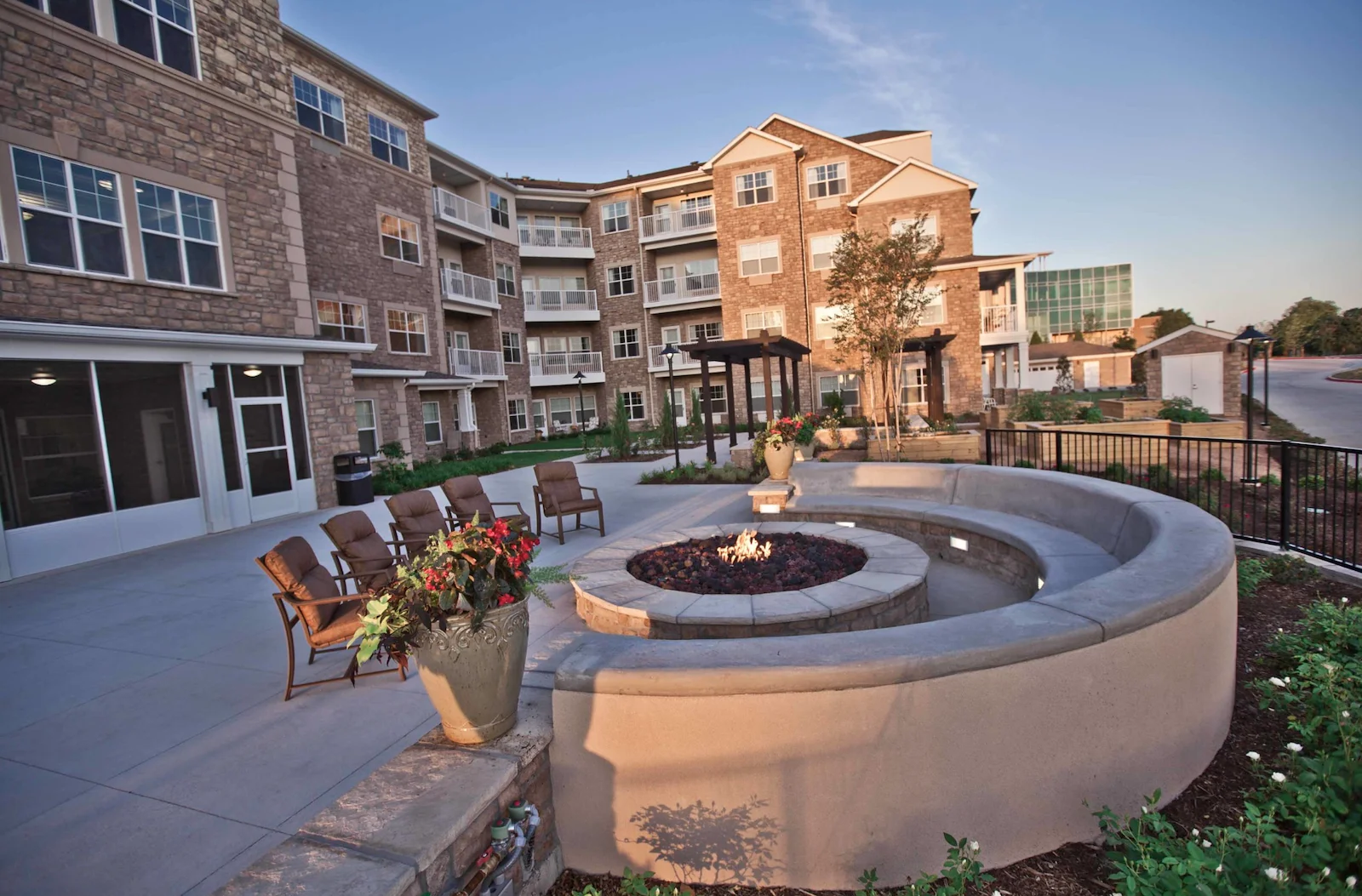 Pioneer Ridge Gracious Retirement Living Hawthorn Senior Independent Living in McKinney, Texas rear exterior patio firepit