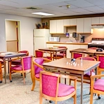 Grande Ronde Retirement Residence senior living community offering independent living, assisted living, and respite care in La Grande, OR, common area with tables for dining or activities