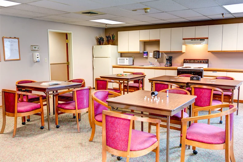 Grande Ronde Retirement Residence senior living community offering independent living, assisted living, and respite care in La Grande, OR, common area with tables for dining or activities