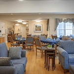 Charter Senior Living of Bowie sitting area with couches and tables