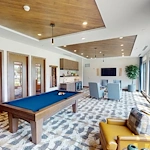 CopperWood at Prairie Trail senior living community offering assisted living and memory care in Ankeny, IA, activities room with a pool table