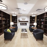 Allegro Richmond Heights senior living offering assisted living, memory care, and respite care in Richmond Heights, MO, cozy sitting area by a fireplace