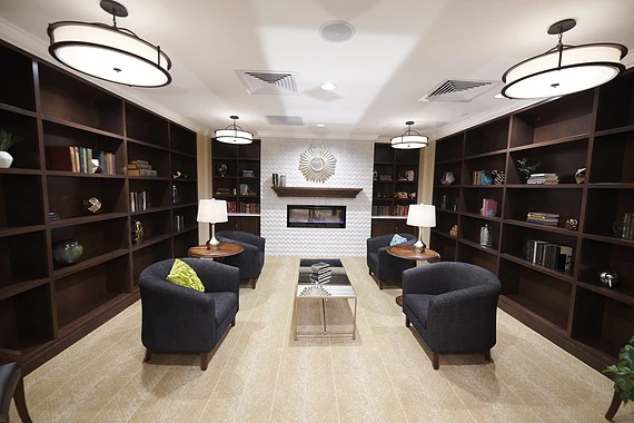 Allegro Richmond Heights senior living offering assisted living, memory care, and respite care in Richmond Heights, MO, cozy sitting area by a fireplace