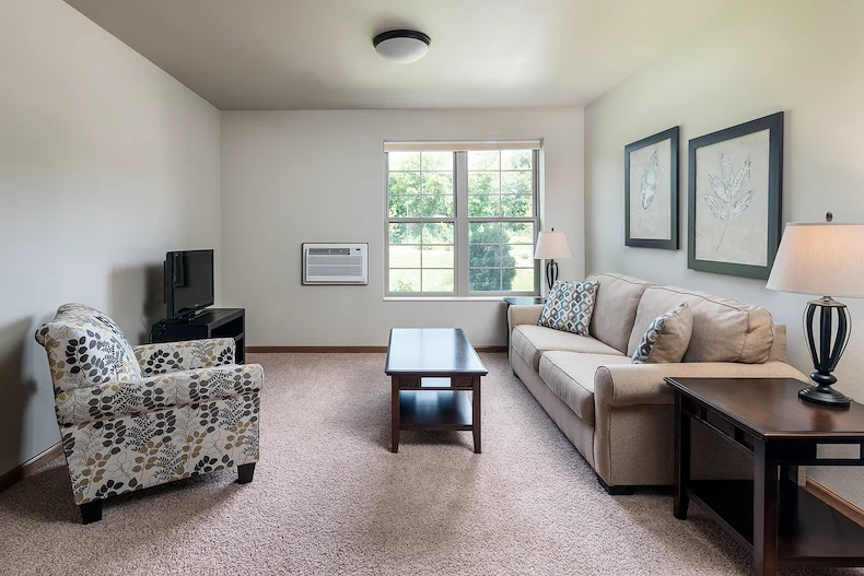 Noel Manor Retirement Living Verona, WI, one bedroom apartment living room
