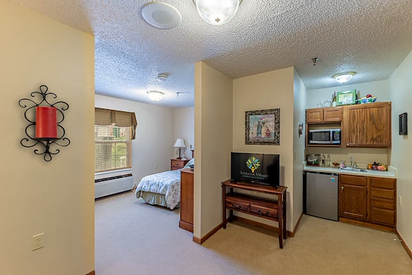 Ashbrook Village senior living community offering independent living, assisted living, and memory care in Duncan, OK, studio apartment featuring a bedroom and kitchenette