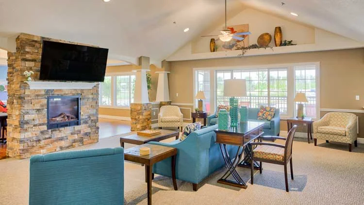 Charter Senior Living of Bay City sitting area by fireplace