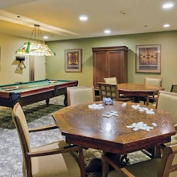 Hillside Senior Living in McMinnville, OR, community activities room with pool table