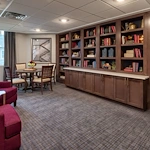 The Commons on Meridian Senior Living in Indianapolis, IN library bookshelf