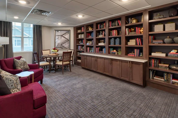 The Commons on Meridian Senior Living in Indianapolis, IN library bookshelf
