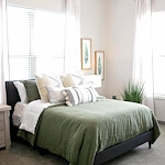 Astral at Auburn, senior living community offering independent living, assisted living, and memory care in Auburn, IN, cozy apartment bedroom