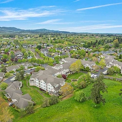 Stoneybrook Lodge Gracious Retirement Living Hawthorn Senior Independent Living in Corvallis, Oregon front exterior drone view
