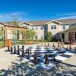 Anthem Lakes, senior living community offering independent living, assisted living, and memory care in Jacksonville, FL, outdoor space with game setup