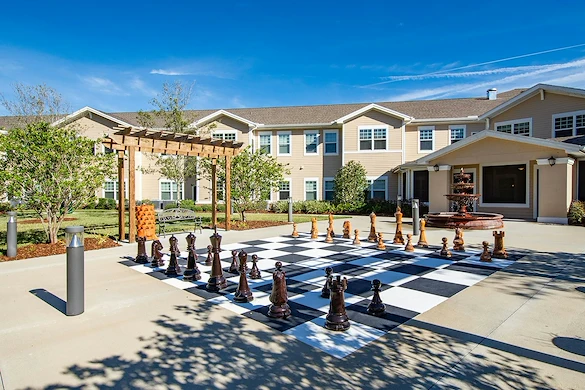 Anthem Lakes, senior living community offering independent living, assisted living, and memory care in Jacksonville, FL, outdoor space with game setup