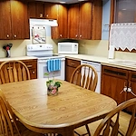 Legato Living Residential Memory Care at Eastridge senior living community offering assisted living, memory care, adult day services, and respite care in Omaha, NE, kitchen and dining table