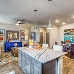 Watermere McKinney senior living community offering active adult living and independent living in McKinney, TX, apartment kitchen, dining, and living space