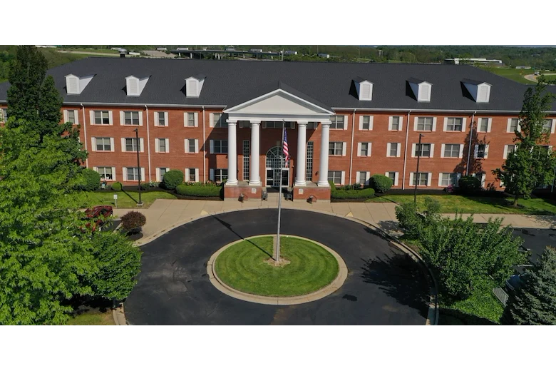 Long House senior living community offering independent living and respite care in Erlanger, KY, front exterior with brick facade