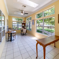 Ashbrook Village senior living community offering independent living, assisted living, and memory care in Duncan, OK, community space with large windows