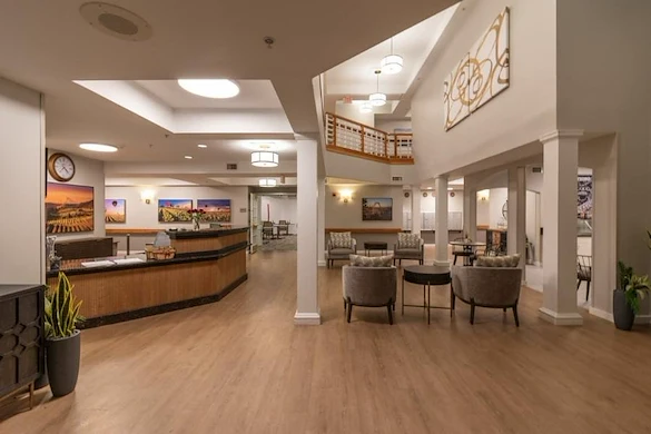 Avamere at Sandy senior living community offering assisted living, memory care, and respite care in Sandy, OR, lobby with front desk and sitting area
