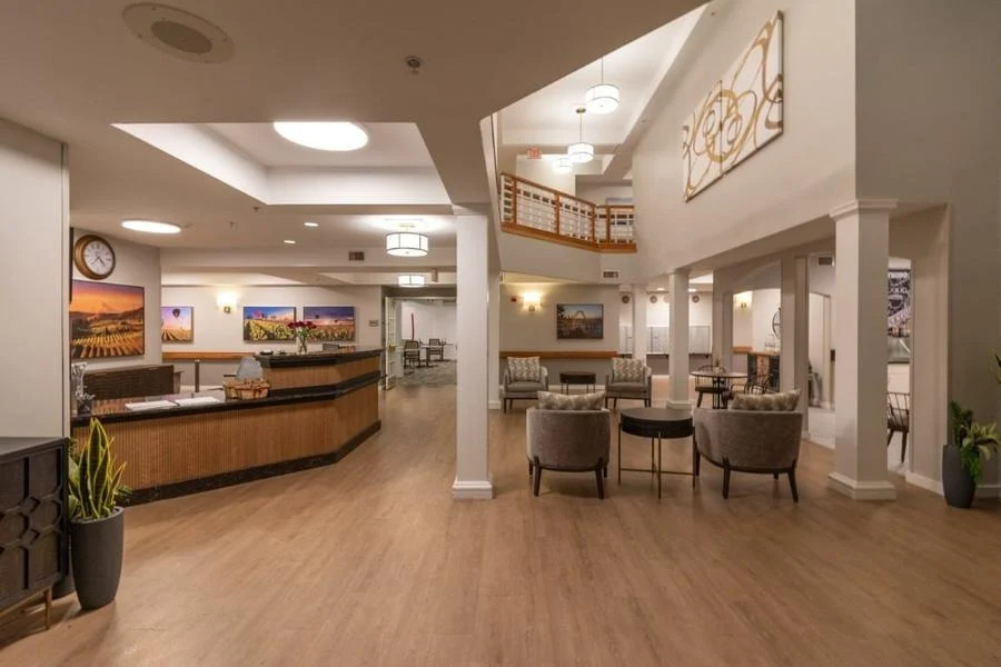 Avamere at Sandy senior living community offering assisted living, memory care, and respite care in Sandy, OR, lobby with front desk and sitting area