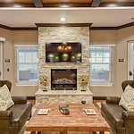 Anthem Lakes, senior living community offering independent living, assisted living, and memory care in Jacksonville, FL, sitting area by fireplace