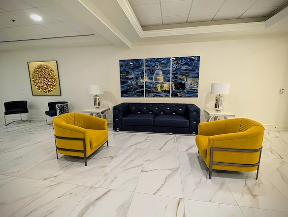 Lenox on the Lake senior living community offering assisted living and memory care in Lauderhill, FL, community sitting area