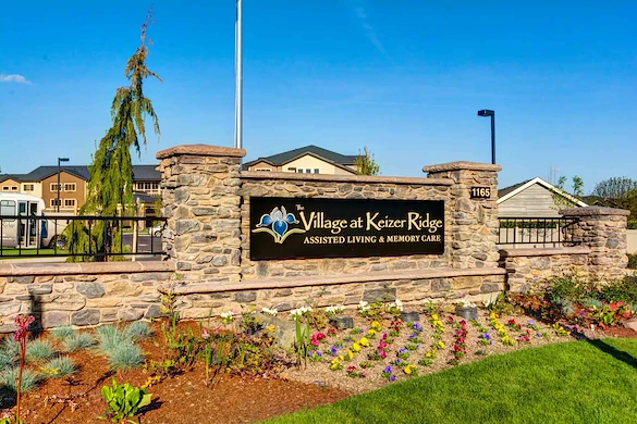The Village at Keizer Ridge Assisted Living and Memory Care community sign