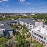 Independent living, assisted living, and memory care at Las Fuentes Resort Village in Prescott, AZ, exterior view from above