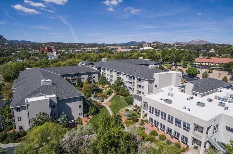 Independent living, assisted living, and memory care at Las Fuentes Resort Village in Prescott, AZ, exterior view from above
