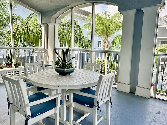 Alto Stuart, senior living community offering assisted living, memory care, and respite care in Stuart, FL, outdoor seating on a covered balcony
