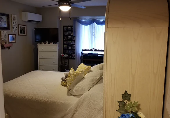 United Manor independent senior living in DeWitt, Iowa apartment bedroom