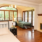 Legato Living Residential Memory Care at Rockbrook senior living community offering assisted living and memory care in Omaha, NE, shared suite featuring two beds and two nightstands