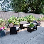 Albany Senior Living by Cogir, assisted living and respite care community in Albany, OR, outdoor seating area with beautiful flowers