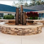 Viva Senior Living's waterfall feature in their outdoor space
