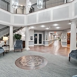 Brightmore of South Charlotte senior living community offering independent living, assisted living, and memory care in Charlotte, NC, lobby area with casual seating